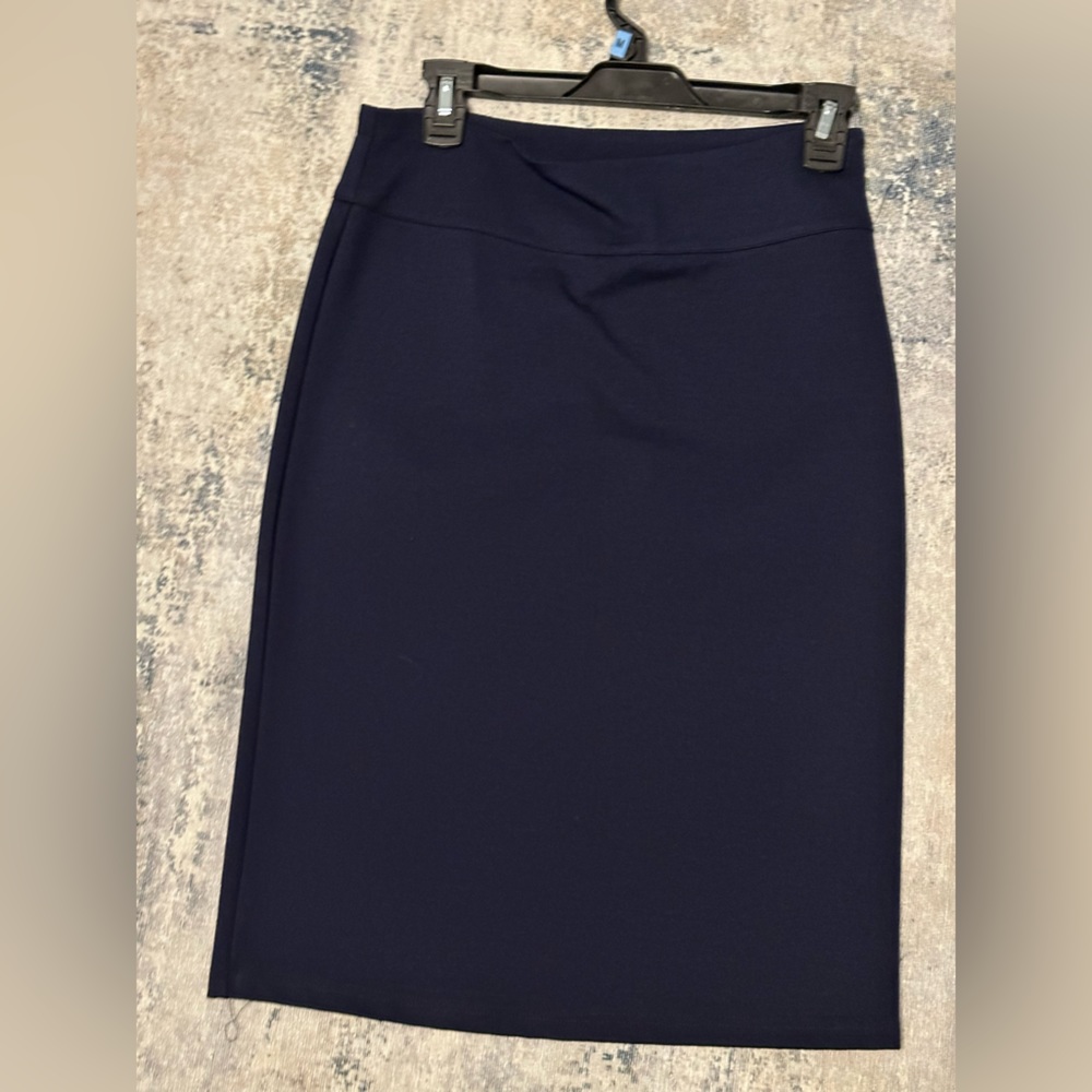 Above knee length navy blue skirt